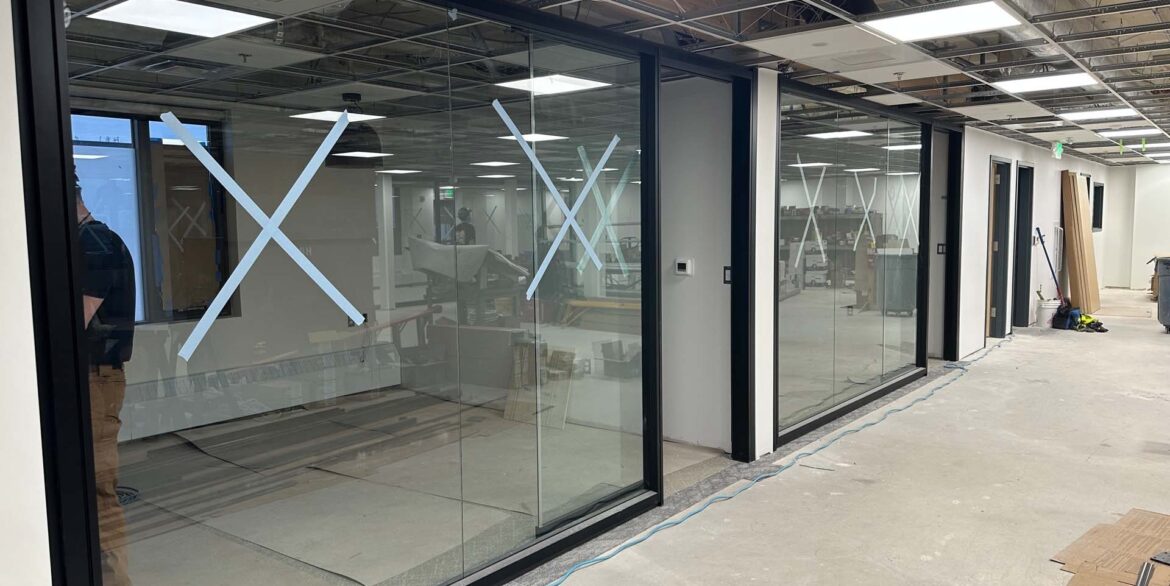 HPM-Enstar-Natural-Gas-Company-Headquarters-Upgrade-interior-glass